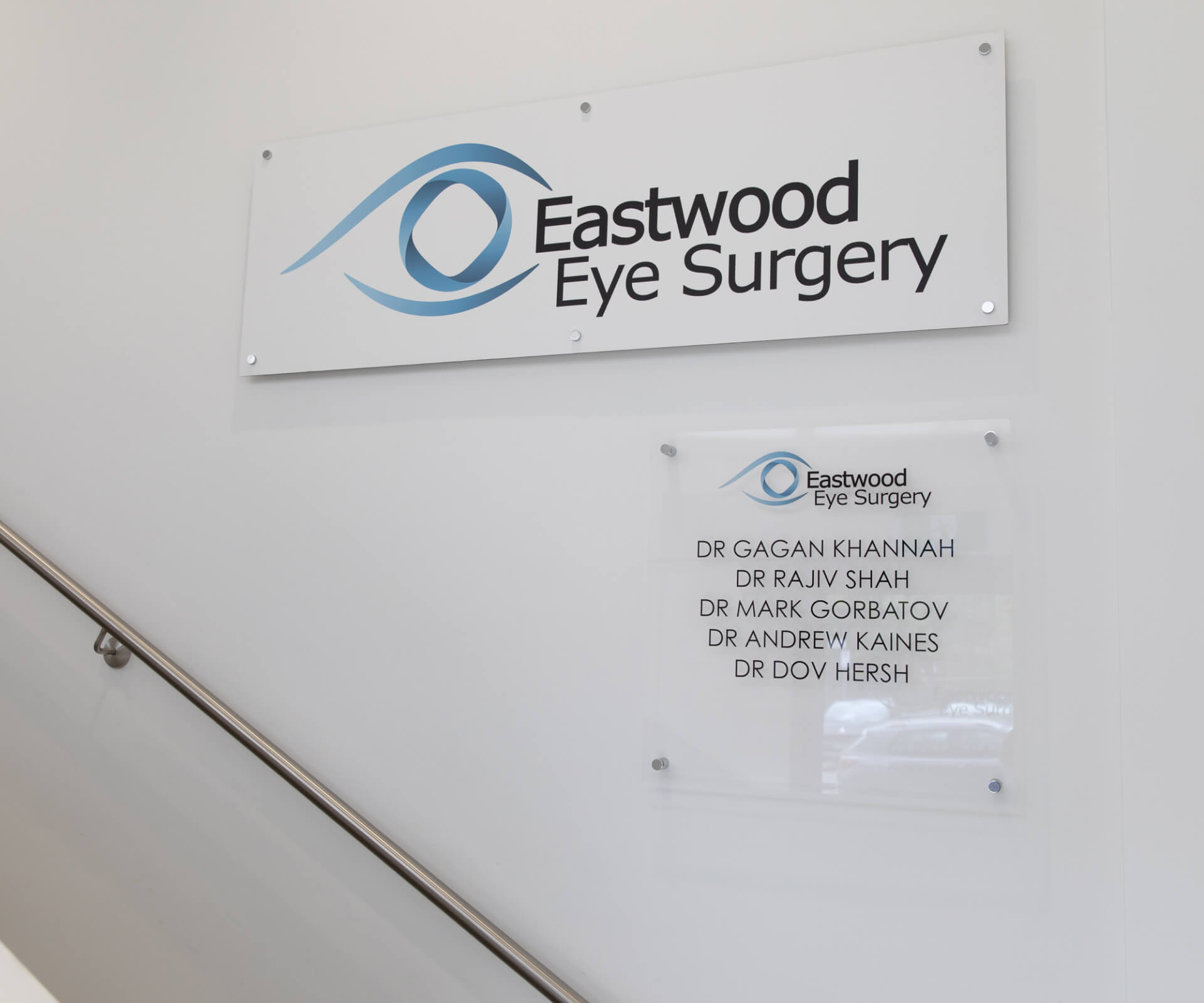 Eastwood Eye Surgery ophthalmologist examining a patient's eye at the slit lamp during a cataract assessment